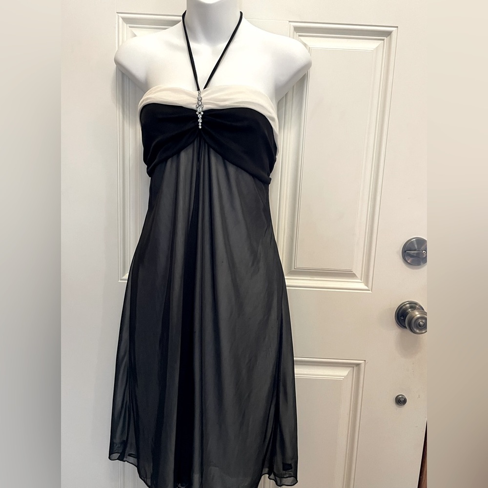 Jolie Size 12 halter style cream with black sheer overlay mid length dress.